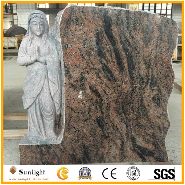Aurora granite tombstone with carving